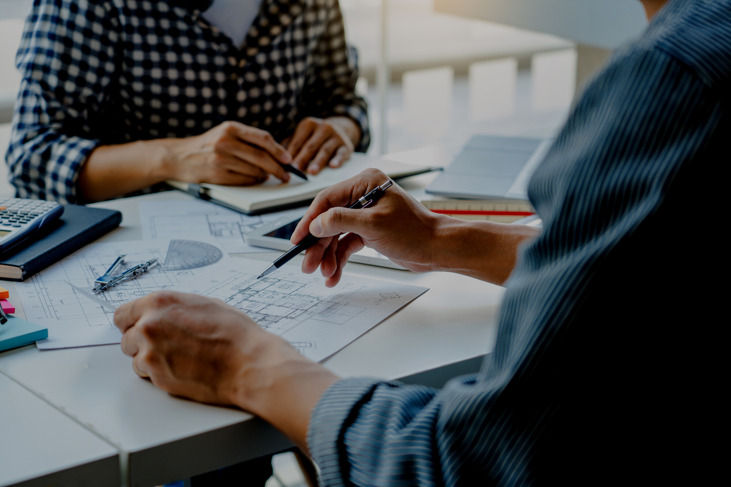 Architects Discussing Floor Plan